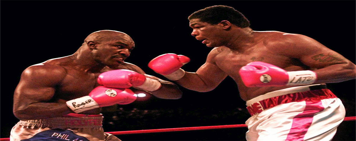 Riddick Bowe và Evander Holyfield