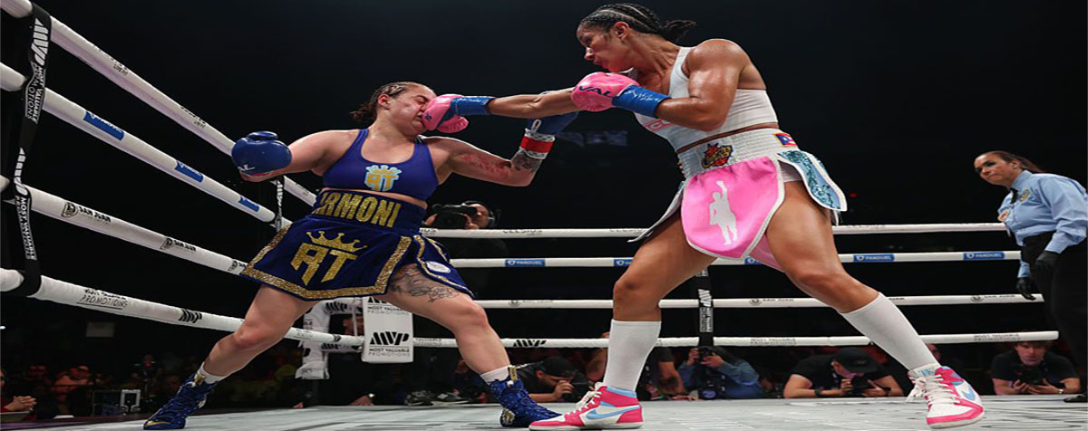 Amanda Serrano thắng điểm Reina Tellez